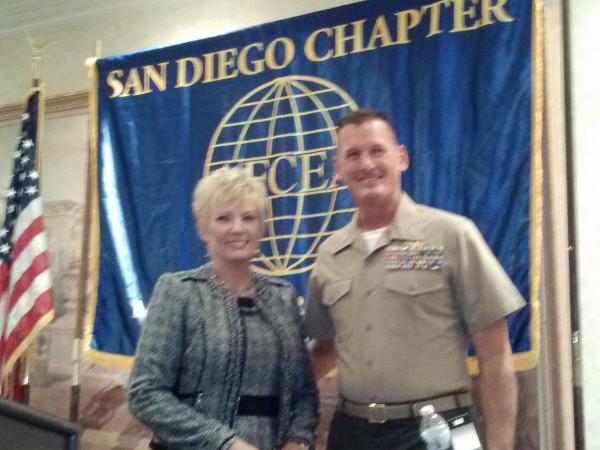 In September, Shirley Adams, chapter vice president for programs, thanks Col. Snyder for his speech.